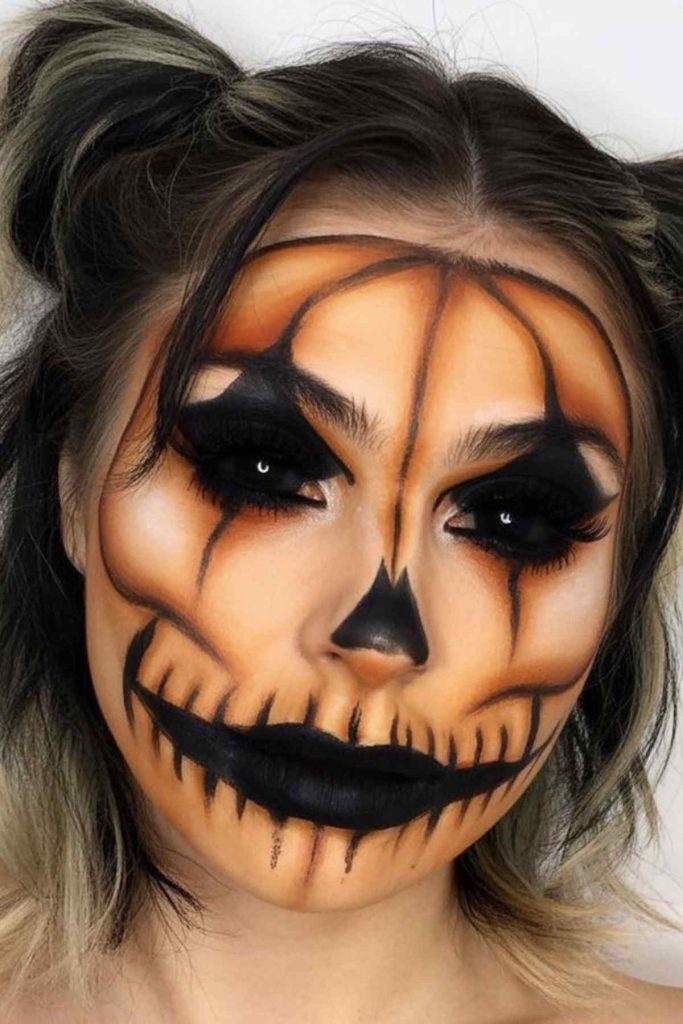Trucco di Halloween a forma di zucca Trucco di Halloween a forma di zucca